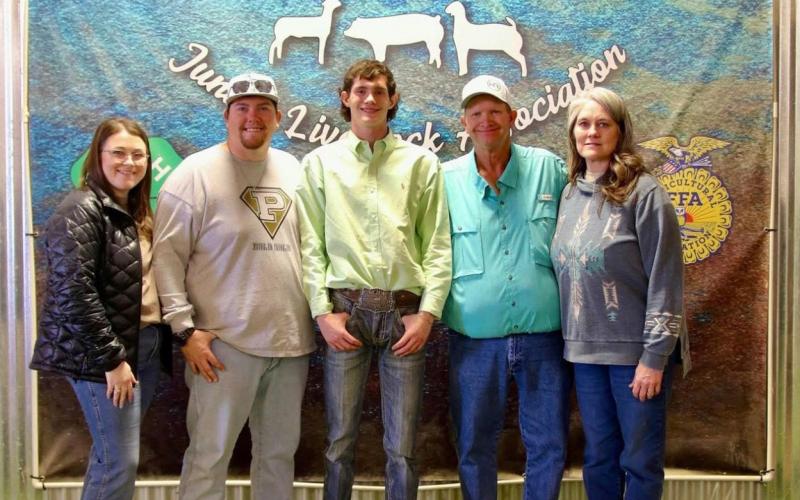 CHUCK AND KRISTI MORRIS with their children at the 2026 Garza County Junior Livestock Show in Post. The family has received widespread community support after a house fire destroyed their home on Jan. 15. | COURTESY PHOTOS