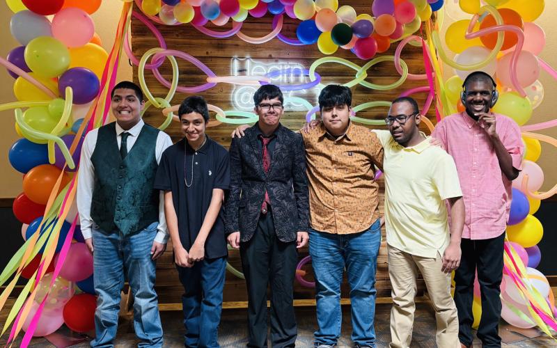 ALL SMILES Malachi Delgado, Adrian Trinidad, Jayden Pewitt, Jafet Rodriguez, Micah Gonzales and Zaidyn Green posed in front of a balloon backdrop at the Special Services Prom on April 15 in Lubbock. | COURTESY PHOTO
