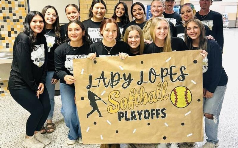 PLAYOFF BOUND The Post Lady Lopes softball team was sent off in style ahead of their bi-district playoff matchup, with students and staff lining up to show their support as the team departed. | COURTESY PHOTO