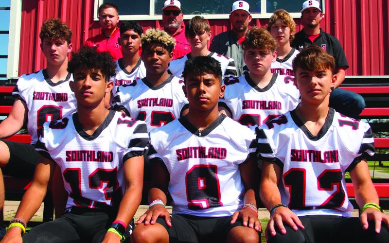 Bottom row L-R #13 Zach Grubbs (SO), #9 Caleb Sanchez (FR), and #12 Spencer McMahan (FR). Second-row #8 Dade Halford (JR), De’Angelo Humphries (JR), and Thallion Arocha (SO). Third-row #3 Rey Flores (JR), #4 Lucien Arocha (SR), and #2 Bryson Nelson (JR) Back row: L-R Coaches Dax Allen, Donald Friers, Dusty Grantham (Head Coach and AD), and Austin Moreno Photo by Elizabeth Jackson SISD
