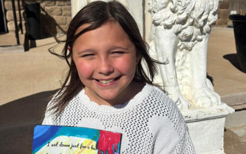 CONTEST WINNER Eva Grizzell, a Post Elementary School student, receives a gift card after winning the Garza County Museum’s Black History Month art contest. | COURTESY PHOTO