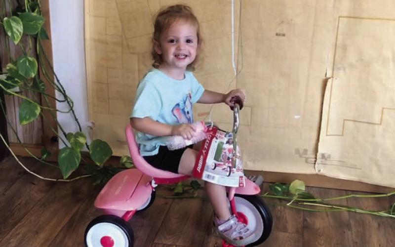 WINNER Paisley Nelson received her bike from Sonic for the July 4 parade drawing. Gunner Johnson, from Lubbock is the Sonic boy winner for his bike who was not available for a photo. | DAWN GRAVES PHOTO