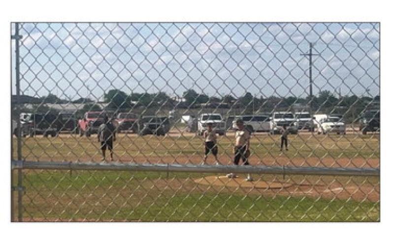TEAM DEFENSE Post Little League players field the ball during defensive action against Slaton on May 23 in Post. | RUSS MORRIS