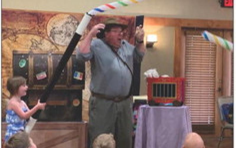LIBRARY MAGIC Pretty Darn Amazing Productions with Wisconsin Johnson by Rick and Kelley De Lung performed for the children and adults who participated in the Public Library summer reading program. The performance was held at the Heritage House Friday. | ANNA GIBSON