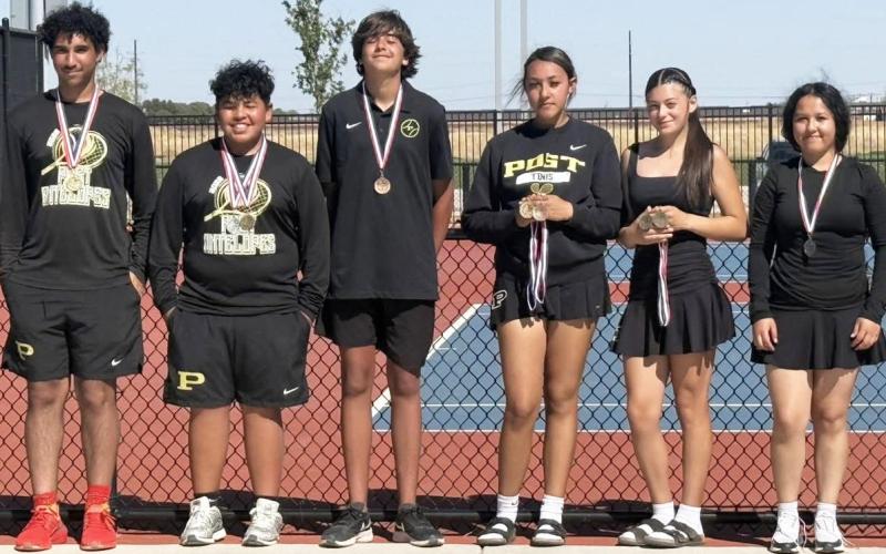 JV HONORS Lysbeth Hernandez and Isabella Salcedo captured the girls doubles title, while Tre Whitehead and AJ Collazo claimed boys doubles to lead JV district champions. Also earning medals were Keith de Lara, second place in girls singles, and Davi Barbosa, third place in boys singles, representing Bold Gold at the district tournament. | COURTESY PHOTO