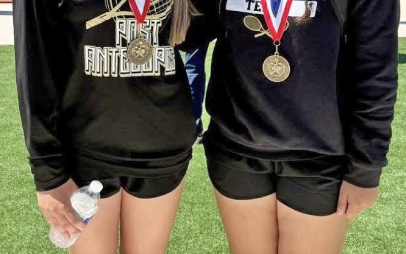 GIRLS DOUBLES Champions Soffi Scott, left, and Rylee Hernandez claimed the girls doubles title for the second consecutive year at the district tennis tournament. | COURTESY PHOTO