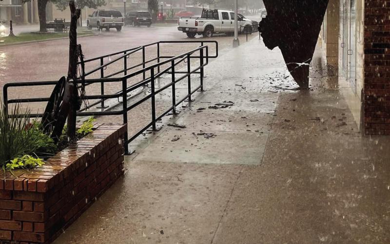 Tower Theater had damage to the marquee awning from the downpour last week. Owners Mike and Dana Holly said that was the only damage to the theater Photo Provided