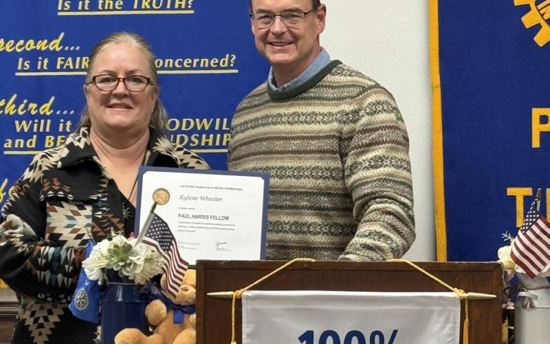 WHEELER RECOGNIZED Kylene Wheeler received her Rotary Paul Harris Fellow commendation from club president Rhett Parker. | COURTESY PHOTO