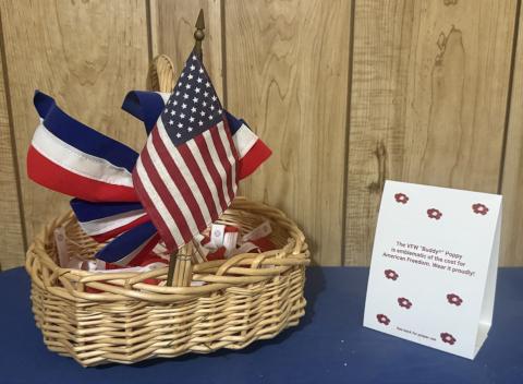 A bright red Buddy Poppy, the official memorial flower of the Veterans of Foreign Wars since 1922, is a symbol of honoring fallen service members and supporting living veterans. | COURTESY IMAGE