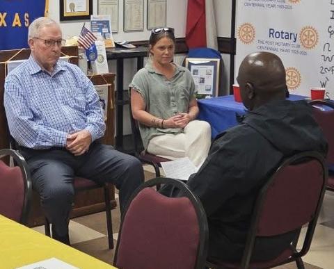 ROLE-PLAYING AT ROTARY Rotarians Terry Jackson, Judge Lee Norman and special guest Traci Jarrett reenact a courtroom sentencing scenario during a Rotary program, depicting a defendant admitting a history of addiction to his spouse before incarceration. | COURTESY PHOTO