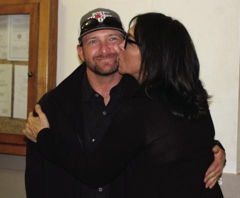PCT. 3 WINNER Newly elected county commissioner for Pct. 3 receives congratulations from his wife, Christina. | STAFF PHOTO