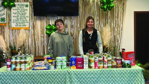 Garza County 4-H members Sarah Palmer and Sylee Peterson look over the donations for the November Community Service project. Canned and dried food items were delivered to Garza CountyTrailblazers beforeThanksgiving. The 4-H members are especially thankful to all who donated to the project and helped to make someone’s Thanksgiving a little more special this year! A special thanks to Sarah, Sylee, and also Jackie Milton for helping to deliver the items to Trailblazers. PHOTO PROVIDED