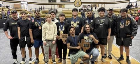 RUNNERS-UP Post High School’s powerlifting team posed with the regional runner-up trophy Saturday in Post. The team finished second overall at the regional powerlifting meet, earning multiple individual honors and advancing lifters to the state meet. | COURTESY PHOTO