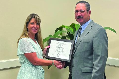 Danya Peterson was recognized for Excellence in Extension for outstanding and measurable programs by an agent with less than five years of experience. Peterson is the Garza County Extension and represents South Plains – District 2 AgriLife Extension. She received her award from Rogelio Mercado, Texas County Agricultural Agents Assoc. President. Photo Provided