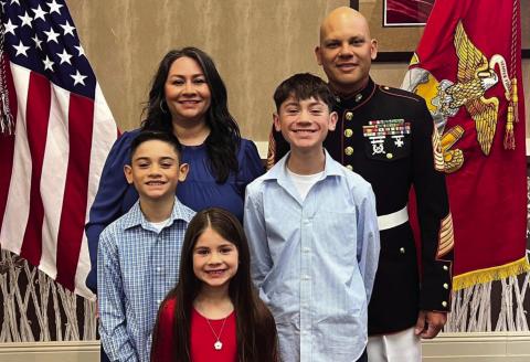 Sgt.MajorOrlandoCastillostandswithhisfamilyduringhisUSMCretirementceremony. | COURTESYPHOTO