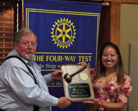 NEW ROTARY PRESIDENT New Post Rotary President Lynn Simpson honors Past President Dr. Xochitl Anderton at their induction dinner on June 27 in the Post Heritage House. During this past year President Xochitl guided her club in achieving three Foundation Awards, the PolioPlus Award, and the RI Club Citation Award. | COURTESY PHOTO