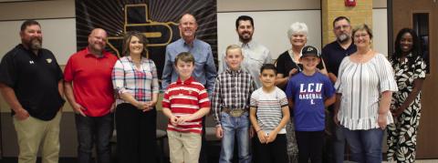 Post ISD School Board honored the students and teachers of the month for April and May. Front row from left to right are Charles Valner, 2nd grade for May, Carson Petty, 5th grade for April, Rodrigo Hernandez Lara, 4th grade for May, Kye Baker, 5th grade for May, and teacher LaNita Lafon. Back row are the trustees, Jett Lott, Joe Don Schoonover, Amy Guthrie, teacher for April, Drew Kirkpatrick, Kris Hernandez, Nancy McDonald, Rick Tadlock, and Chelsey Webb.