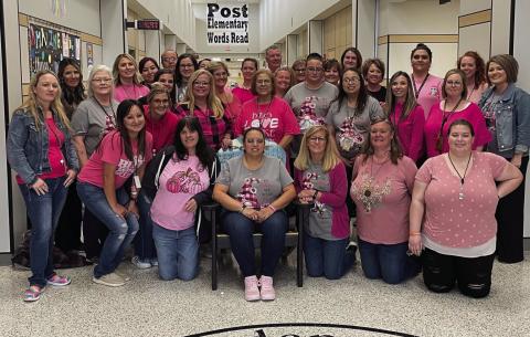At Post Elementary no one fights alone. We are with you Angela Simpson. All the staff wore pink to show their support as Angela Simpson returns to work after being out with breast cancer treatment. Angela is the early childhood special education specialist. Photo by Voda Beth Gradine