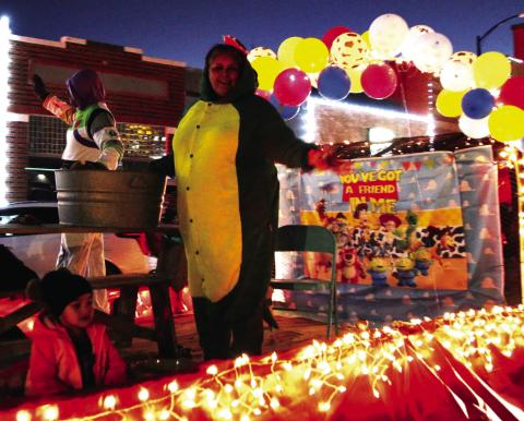 BEST OF SHOW Alice Briseno and Family won the Best of Show in the 2023 Light Christmas Parade with a ‘Toy Story’ themed float. | WHITNEY DORSETT PHOTO