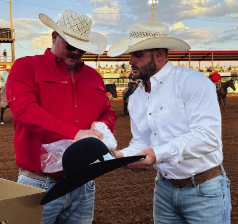 TOP HAND AWARD Tobe Palmer was named the 2024 Premier Top Hand Award at the Post Stampede Rodeo last weekend. Brandon Blacklock, owner of Premier Auto, presented Tobe with the award. Only the men behind the Post Stampede Rodeo truly understand what it takes to make an event of this magnitude possible! Late nights and long hours are just part of being one of the directors of the rodeo. | COURTESY PHOTO