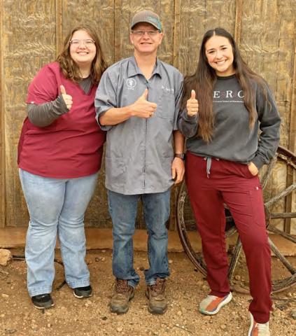 RURAL EXTERNSHIP Texas A&amp;M Veterinary School students Racquel Rodriguez and Allie Walker spent two weeks learning in real-life situations with Dr. Kerry Wink of Post (center). | COURTESY PHOTO