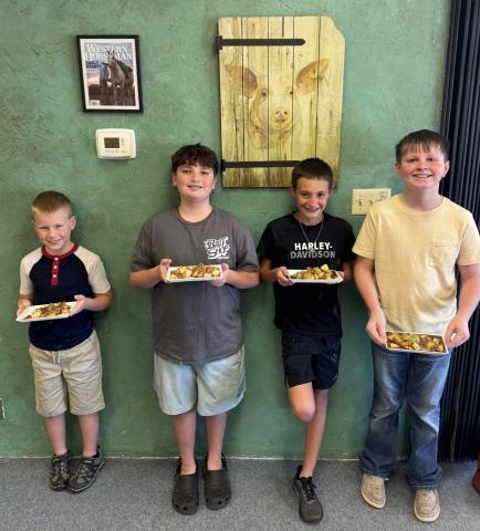 FOOD CHALLENGE Garza County 4-H offers an array of classes for its members, including the Food Challenge. Members learn nutrition facts, diet portions and practice building a visually appealing plate. Challengers, from left, were Connor Griffin, Cooper Britton, Bryson Bloomingdale and Aaron Brooks. | COURTESY PHOTO