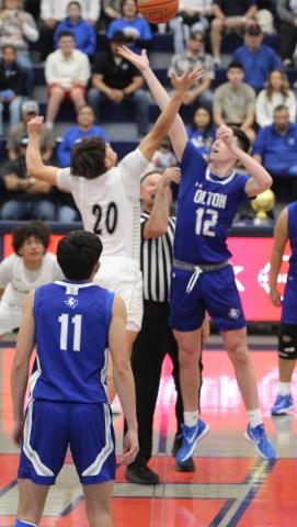 TIP-OFF Players from Post and Olton leap for the opening jump ball. Olton went on to defeat the Bold Gold Antelopes 70-31 on Tuesday, Feb. 24, at Lubbock-Cooper Liberty High School. | POST YEARBOOK