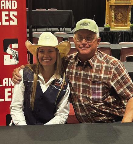 SPC RODEO Sylee Peterson of Southland High School has signed a letter of intent to rodeo at South Plains College in Levelland. Shown with Sylee is her dad, Paul Peterson. | COURTESY PHOTO