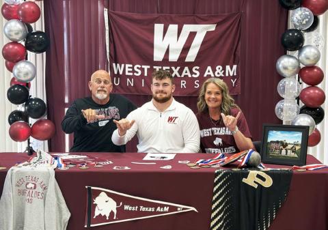 Post High School senior Mason Wright (center) signed April 23 to compete in discus, shot put and hammer at West Texas A&amp;M University, joined by his parents, John and Mechelle Wright. Wright is a four-time state track and field qualifier. | COURTESY PHOTO