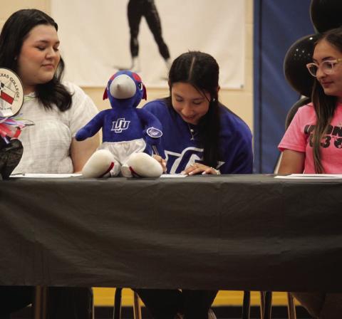 LCU Abigail Rodriguez signed her letter of intent with Lubbock Christian University where she will pursue a Bachelor of Science degree in Nursing. Looking on as she signs are Zoey Pequeno and Madeline Soria. | COURTESY PHOTO