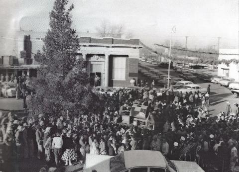 Crowds gather for the lighting of the live Christmas tree in the 1960’s in downtown Post. The tree will be lighted then Santa will arrive. Kid will be looking for him everywhere, even from the sky, maybe. Courtesy Photo