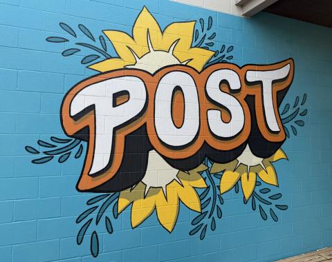 NEW THINGS POPPING IN POST The brightly-hued mural at the Post Community Center, painted by Cal Johnson, captures the spirit of revitalization efforts already underway thanks to a new initiative. | POST DISPATCH