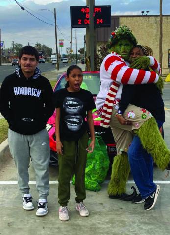 THE GRINCH The WTX Grinch came to Post Monday, December 2. He stopped at McDonald’s from 4 p.m. - 5 p.m. for free pictures. A few locals made their way and took some photos. You may find more photos on page 6 | PHOTOS PROVIDED