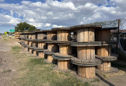 EMPTY SPOOLS were stacked after the large safety barrier project on Highway 84. The spools sit and wait for a truck to collect. | PAULA JACKSON PHOTO