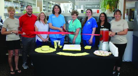 RIBBON CUTTING, Alisa Peters, owner of Hometown Pharmacy, is shown cutting a ribbon with the Post Chamber of Commerce for their business milestone of 20 years. Pictured are Chamber Board memberJoannTravis,PharmacistDanielCapps,ChamberBoardmemberSusanMcDonald,Ownerand PharmacistAlisaPeters,SherrieWilson,MeaganReiter,AndreaMenchaca,andChamberBoardmember Michele Liston. Peters says,“Thank you for letting me serve you for 20 years.” | ANNA GIBSON PHOTO
