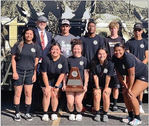 Aaron Rathbun and his seniors display their trophy at regional competition. Courtesy Photo
