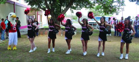 Southland Varsity Cheer leaders along with the Eagle mascot keep the spirit alive during a recent pep rally. The cheer team includes Mascot--Audrey Lee (FR), Makaylee Green (SO), Lizzy Gonzales (FR), Jaleen Levario (SO), Trinity Arocha (SO), Kyleen Garcia (FR), and Natalie Macias (FR). Photo by Elizabeth Jackson