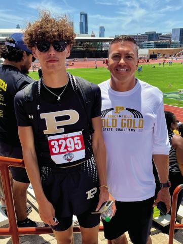 STATE QUALIFIER Assistant coach Zach Ramos stands proudly with his son, Sean Ramos, who placed 7th in the 200m dash at the 2A State Track Meet, marking a memorable finish to a strong junior season. | RUSS MORRIS PHOTO