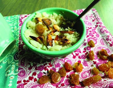 While rice is still hot and in the saucepan, stir in coconut milk, remaining teaspoon of vanilla, and maple syrup. Add the raisins and let cook, stirring occasionally, for 15 minutes. Preheat broiler. Place almonds onto a small baking pan. Sprinkle evenly with sugar. Place under the broiler for 2 to 3 minutes to toast until golden brown, (watch closely to avoid burning). Divide pudding into dishes to serve, and top with a portion of brûléed almonds. Makes 3 to 4 servings. Photo by Angeline LaRue