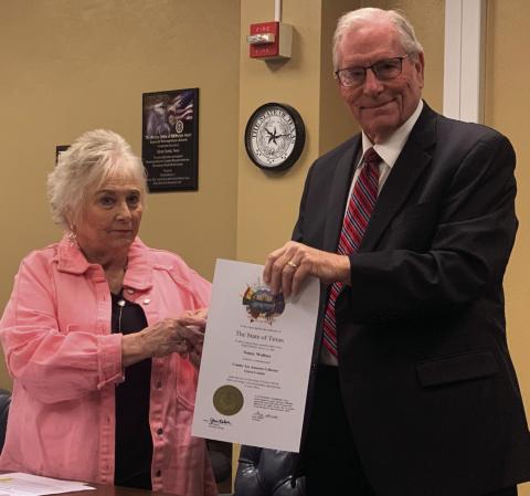 STATE OF TEXAS Garza County elected officials received their State of Texas certificates during the regular commissioners meeting on Monday, Feb. 10. Pictured is Tax Assessor Collector, Nancy Wallace and Judge Lee Norman. | ANNA GIBSON PHOTO