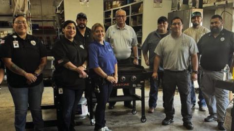 HOT BREAKFAST Giles W. Dalby Facility staff provided breakfast for the Post High School staff, trainers, and both the JV and Varsity teams Thursday. Pictured in front, left to right are Programs Manager Ashlee Cuellar, SIS Marina Cabrera, Admin Assistant Teresa Gomez, SIS Supervisor John Hernandez, and Sergeant Jeremiah DeLeon. Back row: Maintenance Supervisor Zack Sanchez, Warden Ricardo Martinez, SIS Jo Ramirez, and SIS Miguel Gomez. | PHOTO PROVIDED.