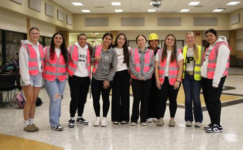 LADY LOPES Post ISD varsity volleyball prepares to go to Abernathy in their construction themed jackets. | KHLOE SMITH PHOTO