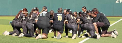 LADY LOPES Members of the Post High School Lady Lopes softball team gathered for a pregame prayer before their bi-district playoff game April 24 at Lubbock Christian University. | COURTESY PHOTO