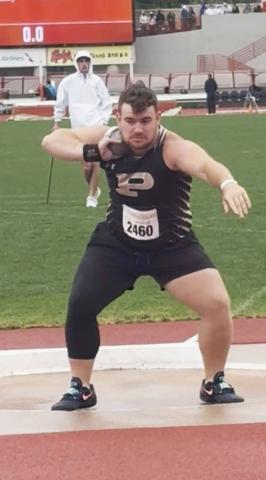 ELITE THROW Mason Wright prepares to release a shot put at the Texas Relays on April 4 in Austin. | COURTESY PHOTO