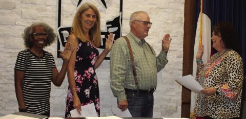 Meg Nelson, City Secretary gave the mayor and councilwomen the oath of office after the council canvased the votes at the City Council meeting Tuesday, May 9. From left to right are Evonne Sapp, representing Ward 1, Pixie Grisham, representing Ward 2, and Mayor Marvin Self.