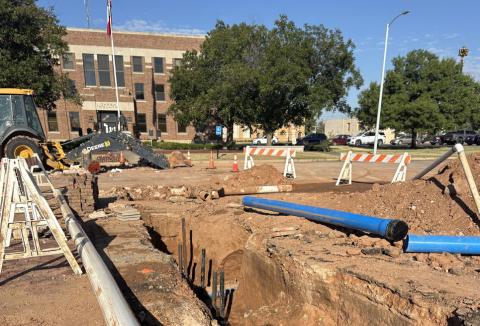 WATERLINE SOLUTION Pipe and valves lay exposed near the Garza County Courthouse as city crews and contractors worked through multiple complications to repair an unexpected leak Monday night. Officials say some lines were not documented on city maps, forcing crews to dig, locate and improvise solutions before repairs can be completed. | POST DISPATCH
