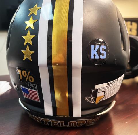 SPECIAL TRIBUTE Post Bold Gold Antelope players wore special baby blue helmet stickers bearing Kyler Smith’s initials during the Sept. 25 game against Hawley. | RUSS MORRIS