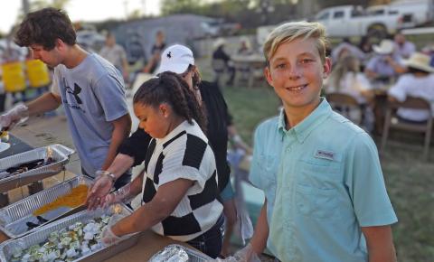 YUM FUN Garza County Junior Livestock members served dinner for their sponsors during last year’s gala. Be sure to buy your tickets now for the 2025 GCJLA gala on Oct. 18. Call Matt Dorsett at (806) 778-0562. | STAFF PHOTO