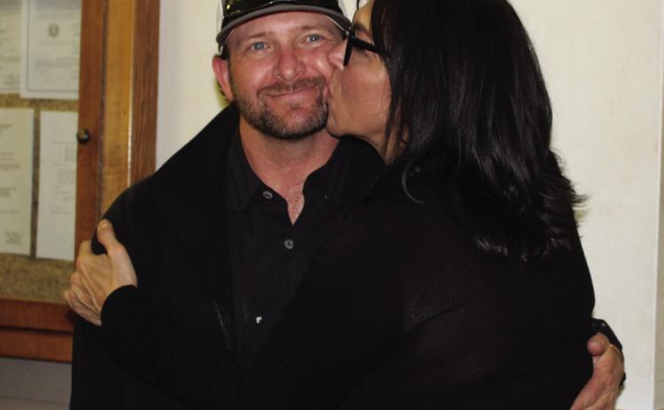 PCT. 3 WINNER Newly elected county commissioner for Pct. 3 receives congratulations from his wife, Christina. | STAFF PHOTO