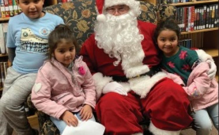 SANTA AT LIBRARY The Post Public Library hosted an open house and Santa